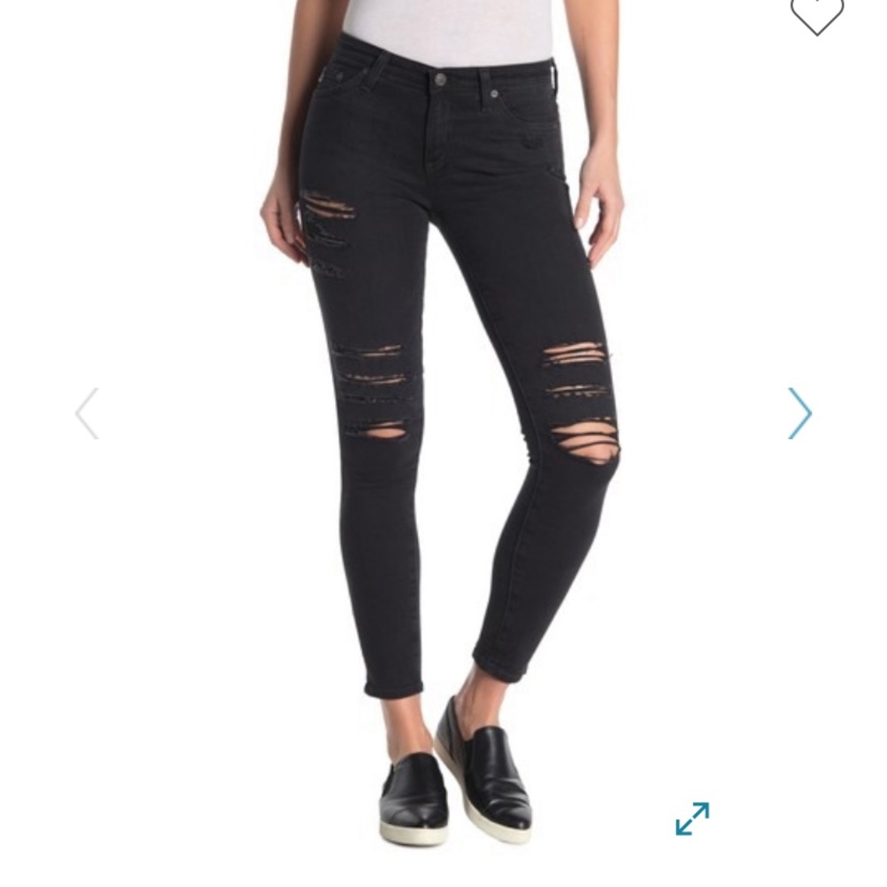 Very distressed, black, super skinny jeans.